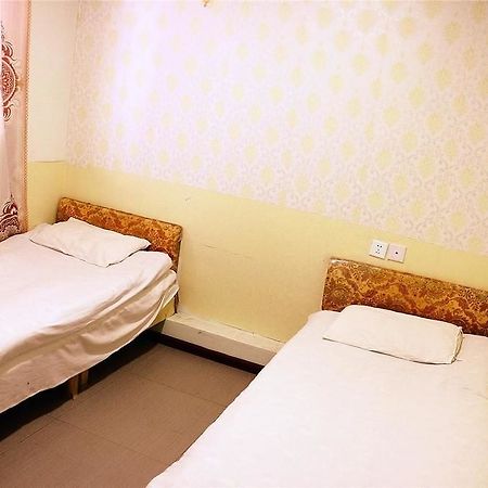 Qingdao Peninsula Four Seasons Business Hotel Buitenkant foto