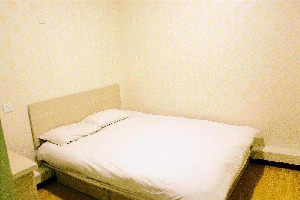 Qingdao Peninsula Four Seasons Business Hotel Buitenkant foto