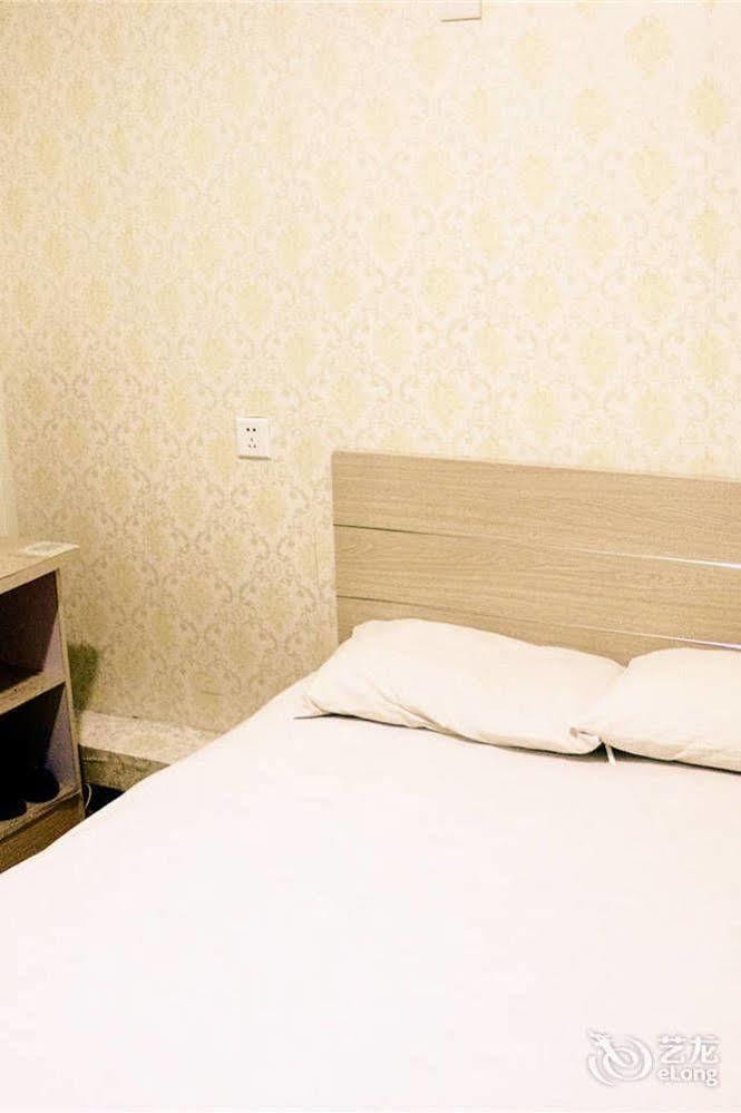 Qingdao Peninsula Four Seasons Business Hotel Buitenkant foto